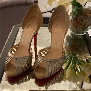 Christian Louboutin Nude and Silver Peep Toe Pump.